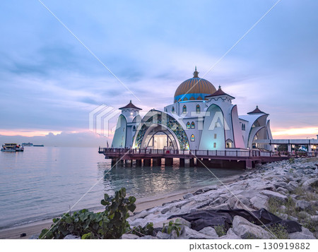 Illuminated Melaka Straits Mosque at dusk 130919882