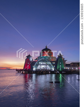 Illuminated Melaka Straits Mosque at dusk 130919885