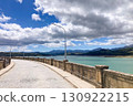 Los Bermejales Reservoir is a tranquil body of water surrounded by scenic natural landscapes and pine forests in the province of Granada, Spain 130922215