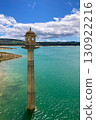 Los Bermejales Reservoir is a tranquil body of water surrounded by scenic natural landscapes and pine forestLos Bermejales Reservoir is a tranquil body of water surrs in the province of Granada, Spain 130922216