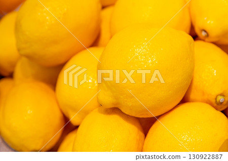 Close up Pile of lemons displayed for sale at market. Lemon background 130922887
