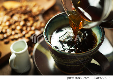 Hot coffee/Coffee poured into a coffee cup 130922898