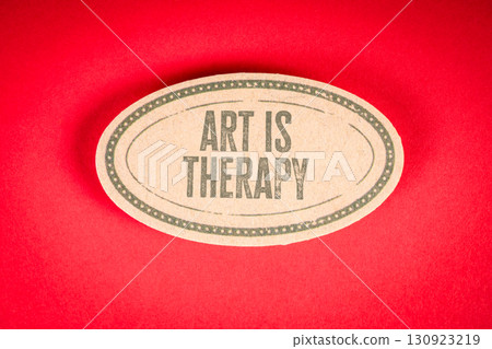 Art is therapy message on vintage label with red background for emotional healing concept 130923219