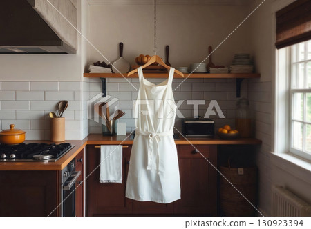 Blank white apron hanging mockup, ai generated 130923394