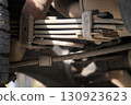 The suspension of a four-wheel drive pickup truck that has been used for rough use 130923623