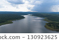 Drone shot. Aerial view scenic landscape of a large river delta amid a lush forest at the tropical Asia place 130923625