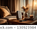 Warm Sunset Living Room with Speaker, Books, and Candle 130923984