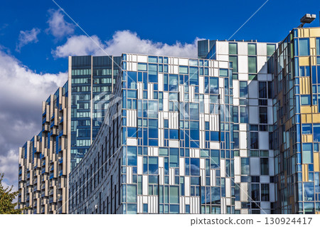 Contemporary Urban Architecture. Reflective Windows and Abstract Geometric Exterior Contemporary Urban Architecture. Reflective Windows and Abstract Geometric Exterior 130924417