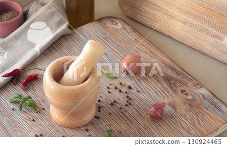 Marble mortar in kitchen. Food and cooking. Healthy eating and organic products. 130924465