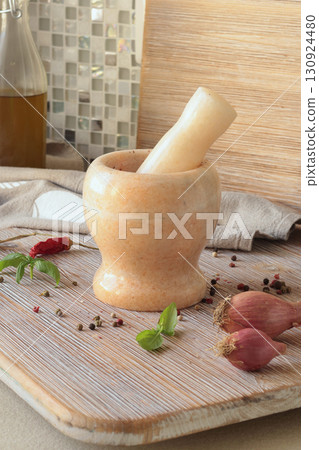 Marble mortar in kitchen. Food and cooking. Healthy eating and organic products. 130924480