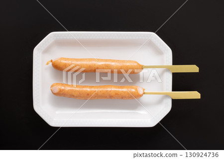 Sausage skewers (before cooking) Sausage skewers (before cooking) 130924736