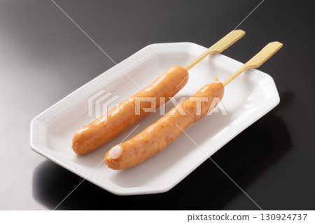 Sausage skewers (before cooking) Sausage skewers (before cooking) 130924737