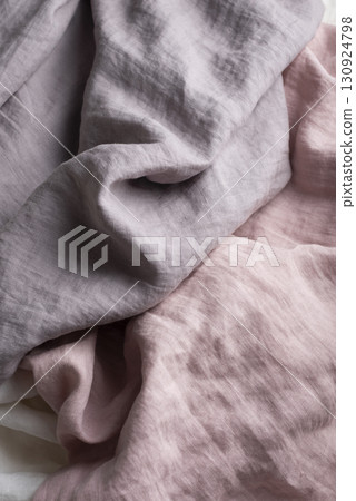 Sewing concept with pink, lilac and white linen fabric Sewing concept with pink, lilac and white linen fabric 130924798