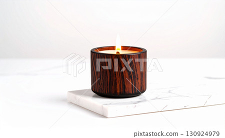 Matte Black Candle with Orange Flame on Marble Tray. Hallowen Concept. Generated Image Matte Black Candle with Orange Flame on Marble Tray. Hallowen Concept. Generated Image 130924979