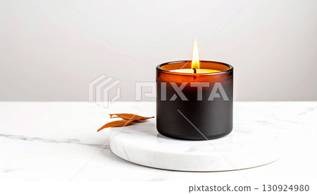 Matte Black Candle with Orange Flame on Marble Tray. Hallowen Concept. Generated Image Matte Black Candle with Orange Flame on Marble Tray. Hallowen Concept. Generated Image 130924980
