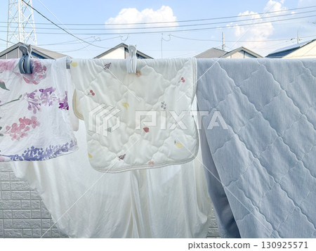 Laundry being dried on the balcony 130925571