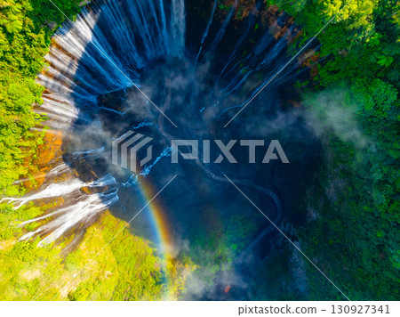 Aerial view of the Tumpak Sewu Waterfalls also known as Coban Sewu.Beautiful Tumpak Sewu Waterfalls are a tourist attraction in East Java, Indonesia.Amazing travel destination in asia 130927341