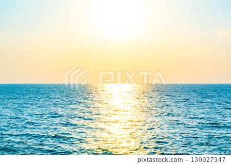 Aerial view Beautiful view sunset over sea surface beautiful wave Amazing light sunset or sunrise sky over sea beach with wave crashing in the ocean.nature background 130927347