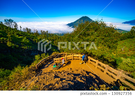 Beautiful landscape view Mountains with fog in sunrise sky at Indonesia 130927356