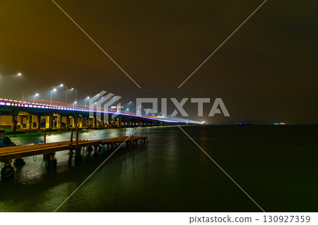 Amazing View of the Penang Bridge in sunset or sunrise sky background Amazing View of the Penang Bridge in sunset or sunrise sky background 130927359