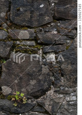 The stone wall of the old fortress of Gvara. The background is a stone wall The stone wall of the old fortress of Gvara. The background is a stone wall 130927585