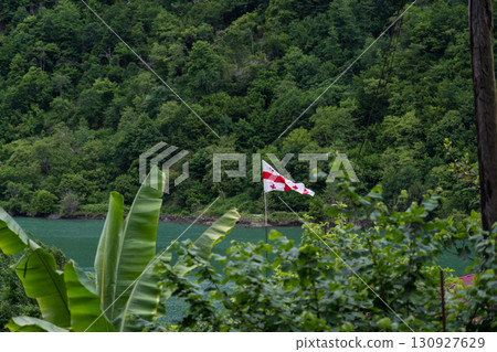 The Georgian flag in the distance by the Chorukh River 130927629