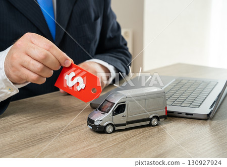 Purchase of new vans for logistics operations and transportation. Sale of new vans. Symbol of supply chains, delivery expansion, modernization of fleets, e-commerce logistics and trade efficiency. 130927924