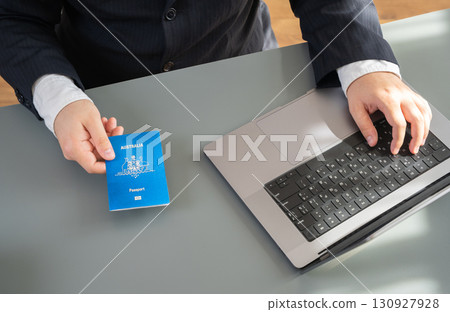 Official hands over Australian passport. Crossing border and customs. Obtaining document or citizenship. Recovering ID. Symbol of migration, travel, international law, visas and global mobility. 130927928