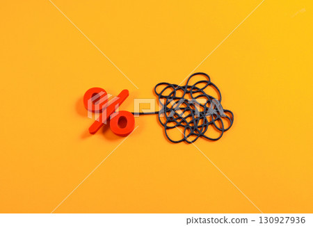 The intricacies of compound interest in loans. The difficulty of getting out of debt. Symbol of financial stress, credit burden, mortgage, economic inequality, and personal finance management. The intricacies of compound interest in loans. The difficulty of getting out of debt. Symbol of financial stress, credit burden, mortgage, economic inequality, and personal finance management. 130927936