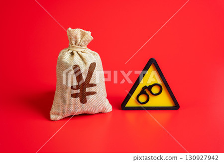 Yen or Yuan money bag and symbol of arrest. Freezing of financial assets. Investigation of money laundering or financial crime. Symbol of sanctions, corruption, fraud, and banking risks. Yen or Yuan money bag and symbol of arrest. Freezing of financial assets. Investigation of money laundering or financial crime. Symbol of sanctions, corruption, fraud, and banking risks. 130927942