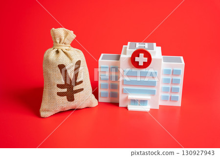 Yen or Yuan money bag and hospital. Investment in health care. Collection for treatment. Symbol of medical financing, health costs, donations, insurance, and economic burden. Yen or Yuan money bag and hospital. Investment in health care. Collection for treatment. Symbol of medical financing, health costs, donations, insurance, and economic burden. 130927943