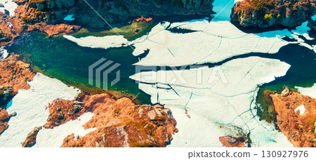 Glacier melted lake in the mountains in summer. Nature park in Sauda municipality. Beautiful nature of Norway, Europe Glacier melted lake in the mountains in summer. Nature park in Sauda municipality. Beautiful nature of Norway, Europe 130927976