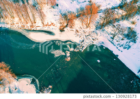 Top view of an unfrozen narrow stream on a sunny winter day 130928173