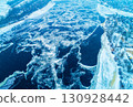 Aerial view of frozen Dnieper River in suburbs of Kyiv 130928442