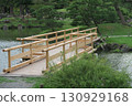 A new bridge is being constructed over the pond at the former Shiba Rikyu Gardens 130929168