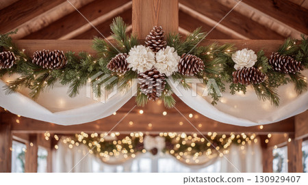 Frosted pinecone garland with Christmas lights on mantel 130929407