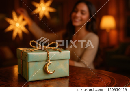 Teal Gift Box With Golden Crescent Charm In Festive Glow 130930419