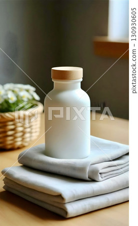 towels and glass jar on table 130930605