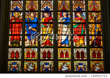 Stained glass windows in the Saint Salvator Cathedral main Roman Catholic gothic church in Bruges, Belgium 130931715