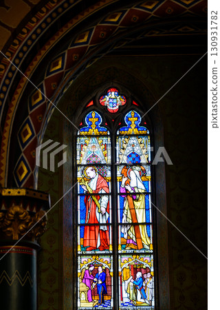 Stained glass windows in Basilica of the Holy Blood, housing a relic of the Holy Blood of Christ in Bruges, Belgium 130931782