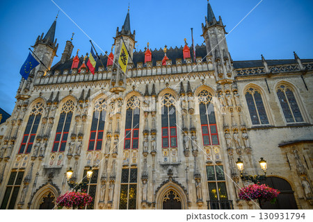 Evening view of Historic Bruges City Hall building on Burg Square in Bruges, West Flanders, Belgium 130931794