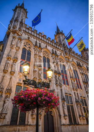 Evening view of Historic Bruges City Hall building on Burg Square in Bruges, West Flanders, Belgium Evening view of Historic Bruges City Hall building on Burg Square in Bruges, West Flanders, Belgium 130931796