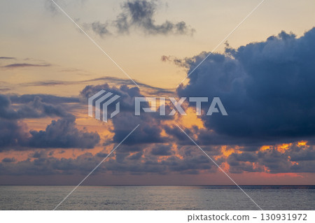 Dramatic sunset by the sea Dramatic sunset by the sea 130931972