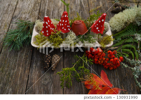 Zero waste fall project using natural and recycled materials to create a mushroom figure. Zero waste fall project using natural and recycled materials to create a mushroom figure. 130931990