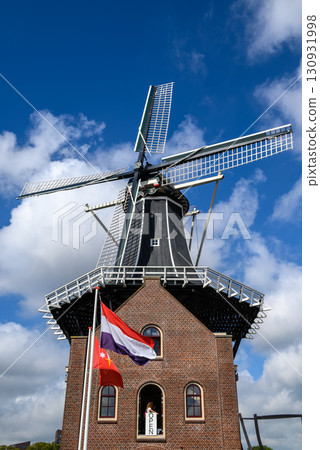 Windmill De Adriaan, popular landmark of the city of Haarlem, Netherlands Windmill De Adriaan, popular landmark of the city of Haarlem, Netherlands 130931998