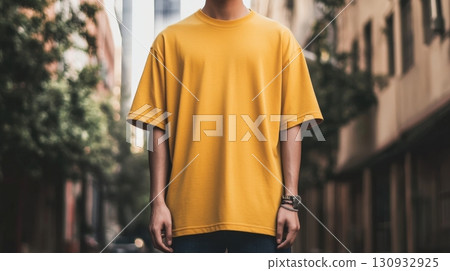 Model is wearing blank T-Shirt. Mockup For Your Design 130932925