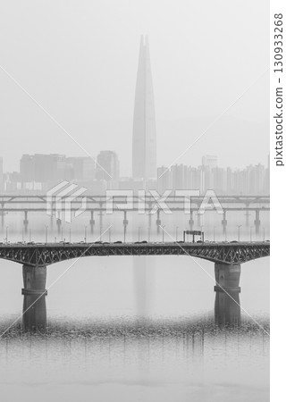 Smog pollution and yellow dust covering cityscape of Seoul, capital of South Korea 130933268
