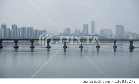 Smog pollution and yellow dust covering cityscape of Seoul, capital of South Korea 130933272