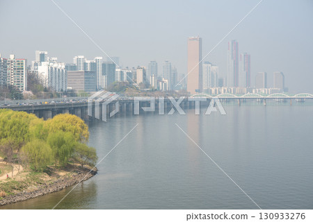 Smog pollution and yellow dust covering cityscape of Seoul, capital of South Korea Smog pollution and yellow dust covering cityscape of Seoul, capital of South Korea 130933276