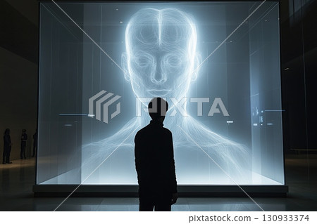 Silhouette man observing futuristic digital human hologram Silhouette man observing futuristic digital human hologram 130933374